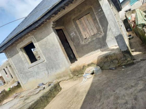 Standard two 2 bedroom bungalow well built on a quarter plot of land in Lagos, 